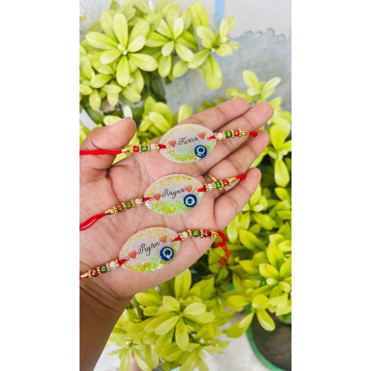 Resin Name Rakhi With Evil Eye